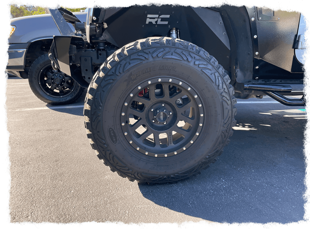 Wheels and thick knobby tires installed on a truck at Outlander Motorsports in Martinez California