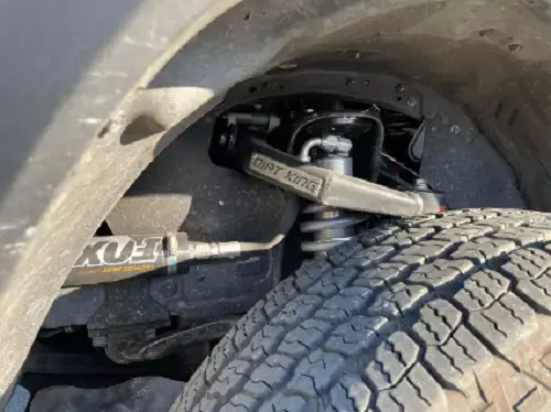 Lift Kit vs. Leveling Kit | Outlander Motorsports in Martinez, CA. Image of a Dirt King suspension lift kit installed by Outlander Motorsports. Concept image of 4x4 upgrades or off-road modification.