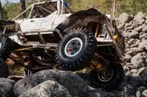 Off-Road Axles: What You Need to Know | Outlander Motorsports in Martinez, CA. Image of a 4WD driving through rocks and water.